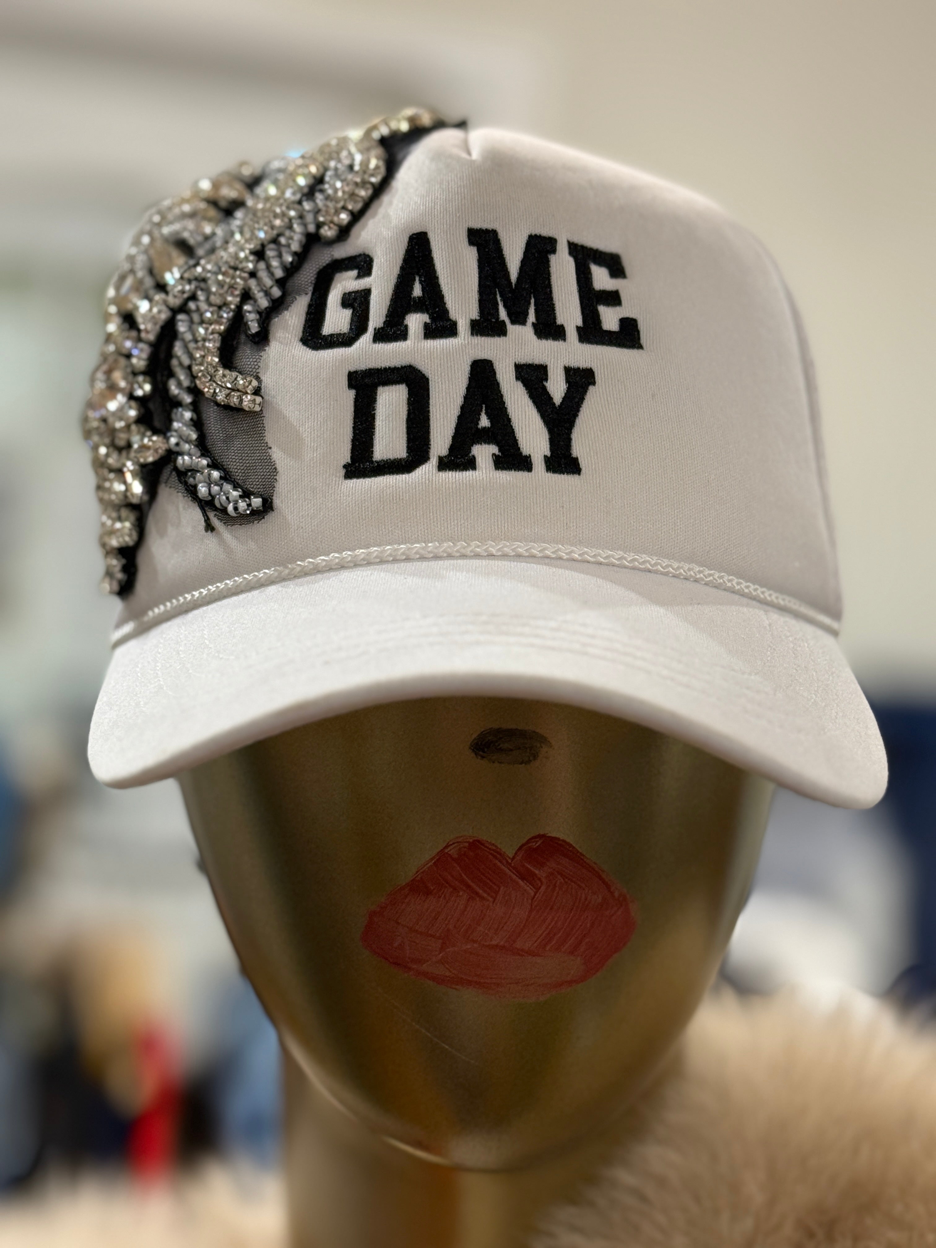 Doll on game day trucker