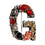Stone Encrusted Letter “G” Brooch