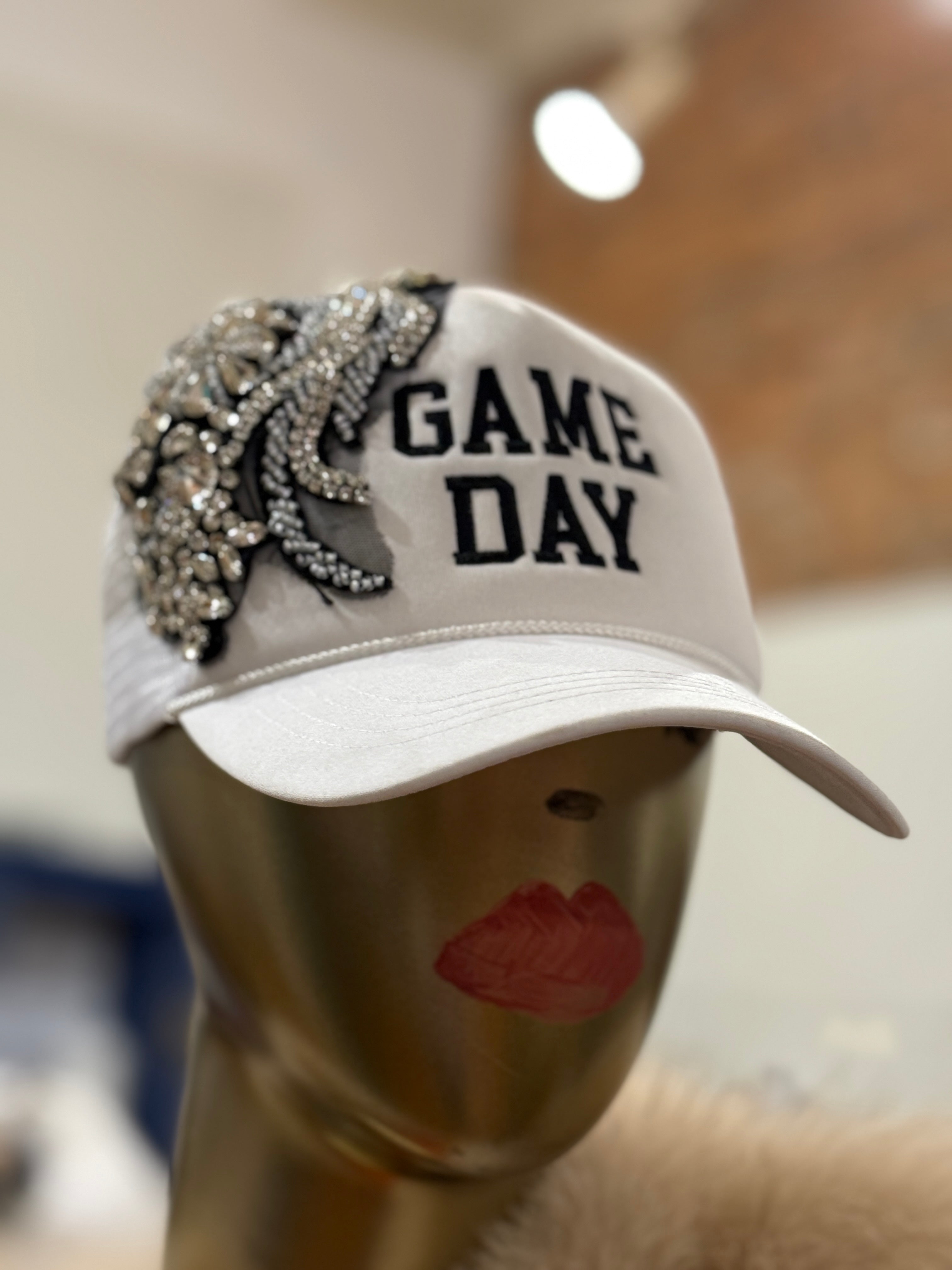 Doll on game day trucker